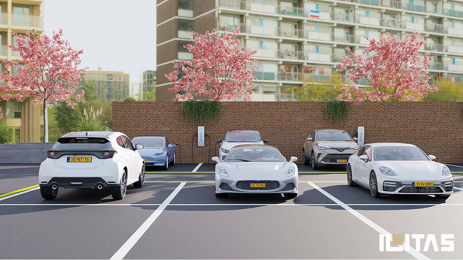 Frontaal zicht op Ecotap DuoWallcharger Nuvia laadpunten voor elektrische voertuigen in een parkeerfaciliteit.